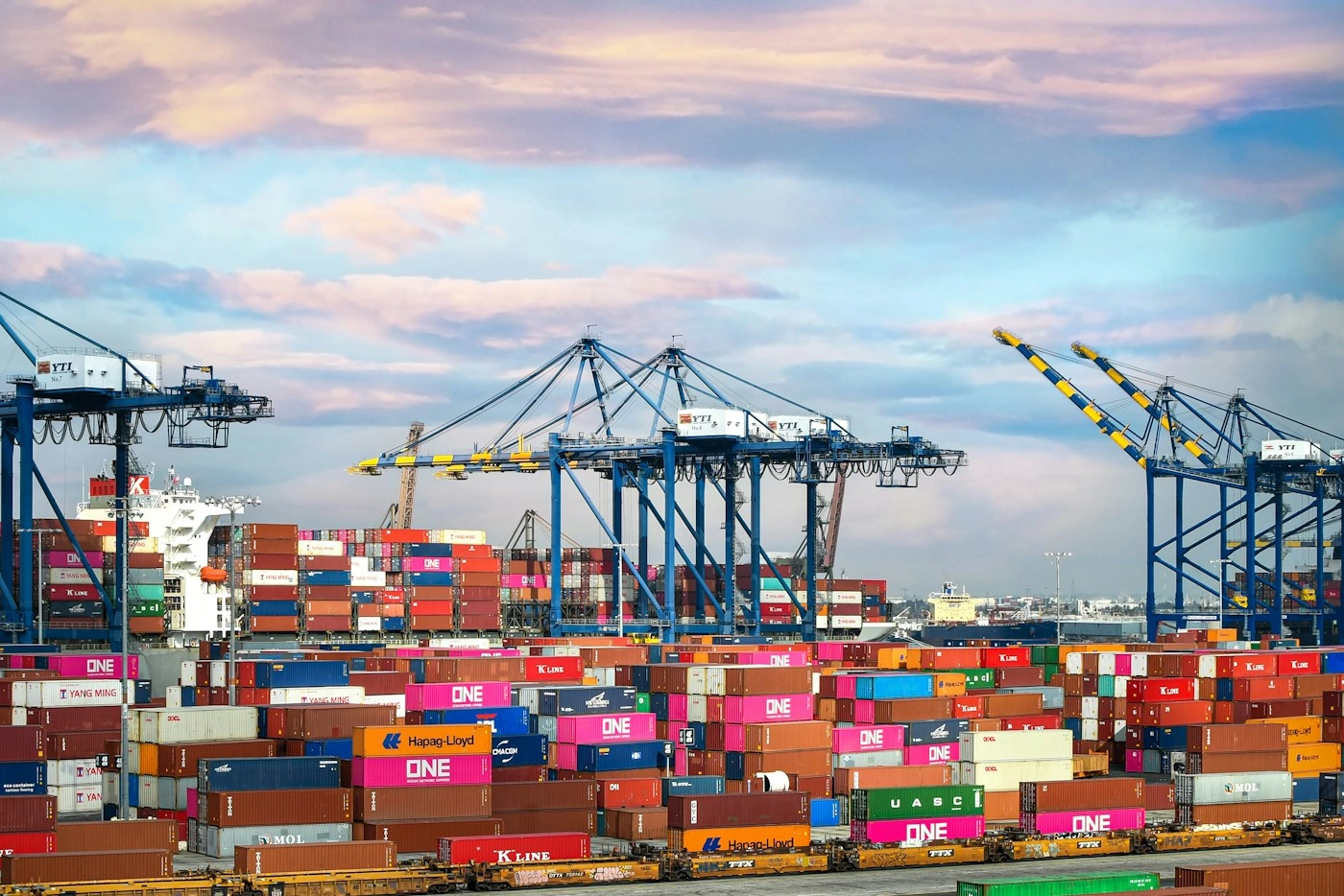 Shipping containers and cranes at an international cargo port